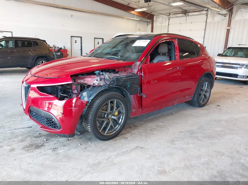 2018 Alfa romeo Stelvio VIN ZASFAKNN1J7C00084 IAAI salvage auction — SIDE, Clear (Michigan), sold $4,550 on 2026-07-09 (photo 2)