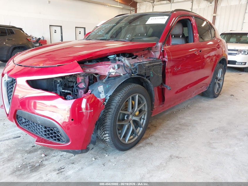 2018 Alfa romeo Stelvio VIN ZASFAKNN1J7C00084 IAAI salvage auction — SIDE, Clear (Michigan), sold $4,550 on 2026-07-09 (photo 6)