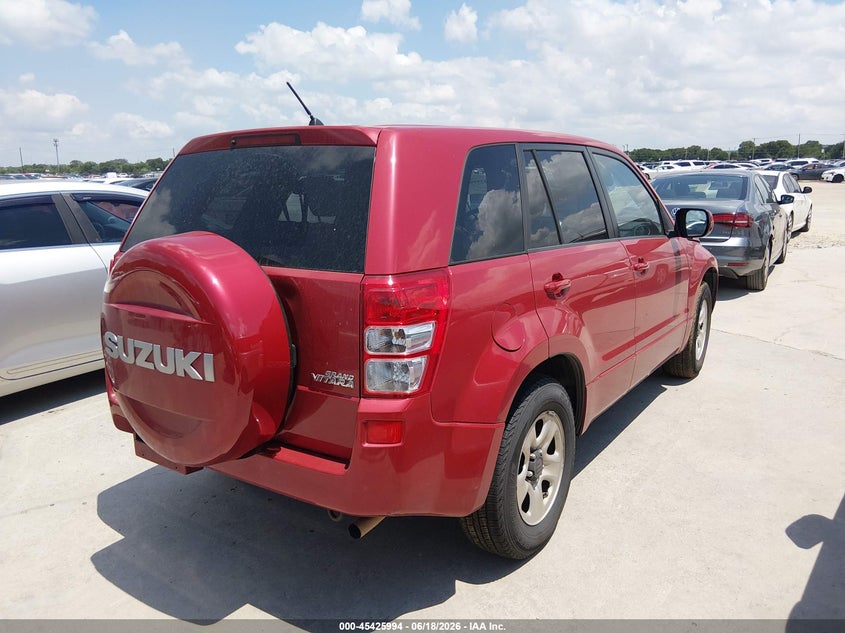 2010 Suzuki Grand vitara VIN JS3TE0D22A4100249 IAAI salvage auction — NORMAL WEAR, Original (Texas), sold $1,200 on 2026-07-13 (photo 4)