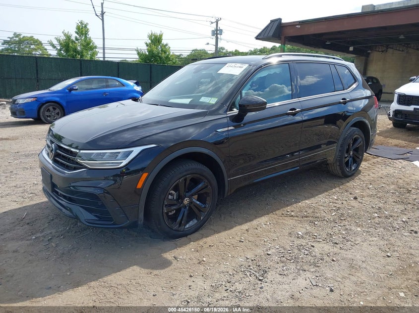 2024 Volkswagen Tiguan VIN 3VV8B7AX1RM161728 IAAI salvage auction — LEFT REAR, Salvage Title, sold $14,500 on 2026-09-01 (photo 2)