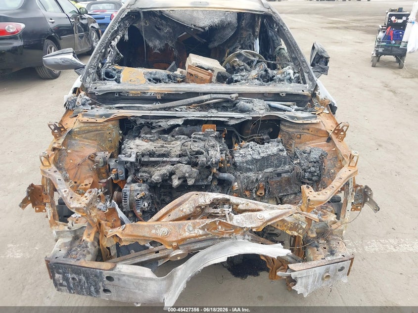 2019 Lexus Ux VIN JTHY3JBHXK2016988 IAAI salvage auction — ENGINE BURN, Salvage Title, sold $175 on 2026-07-15 (photo 6)