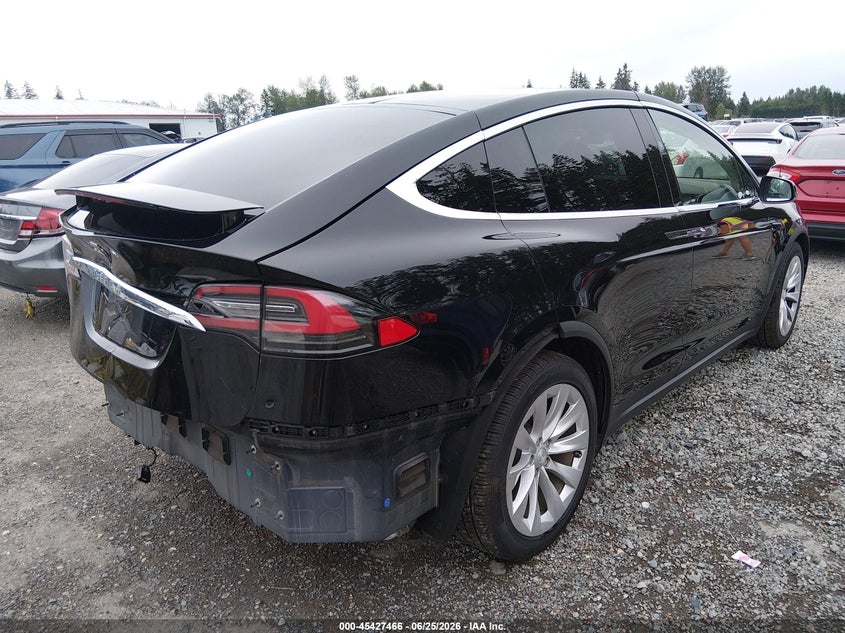 2018 Tesla Model x VIN 5YJXCBE21JF109453 IAAI salvage auction — REAR END, Bill Of Sale (Washington), sold $9,000 on 2026-07-08 (photo 4)