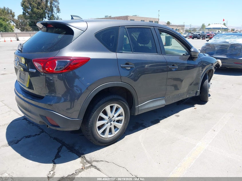 2014 Mazda Cx-5 VIN JM3KE4BE8E0335998 IAAI salvage auction — NORMAL WEAR, Clear - Dealer Only (California), sold $2,100 on 2026-07-06 (photo 4)