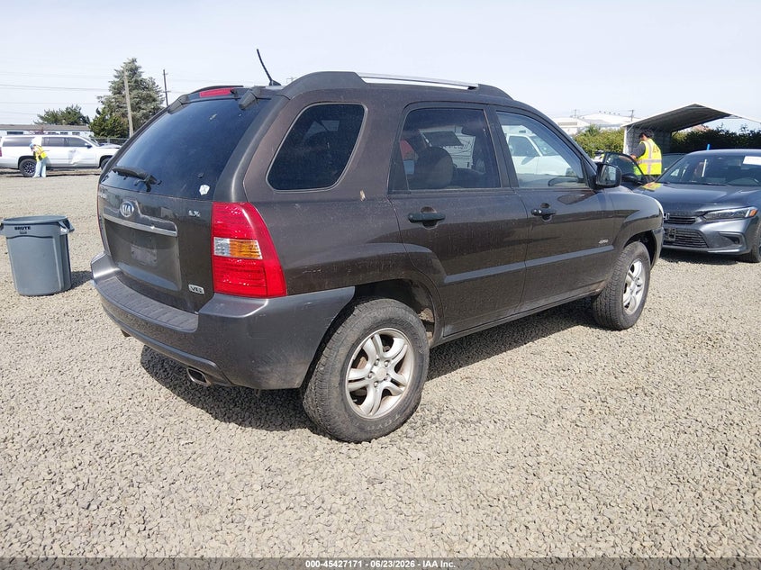 2007 Kia Sportage VIN KNDJE723277348812 IAAI salvage auction — NORMAL WEAR, Peddle Clear Public-Restricted (Oregon), sold $250 on 2026-07-20 (photo 4)