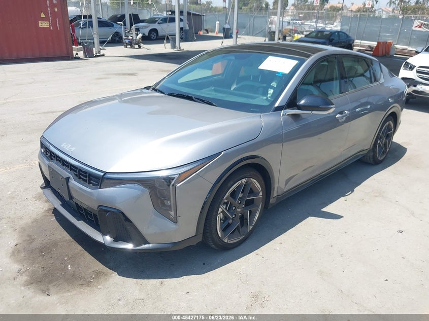 2025 Kia K4 VIN 3KPFW4DE0SE145748 IAAI salvage auction — SIDE, Salvage Title, sold $8,400 on 2026-08-02 (photo 2)