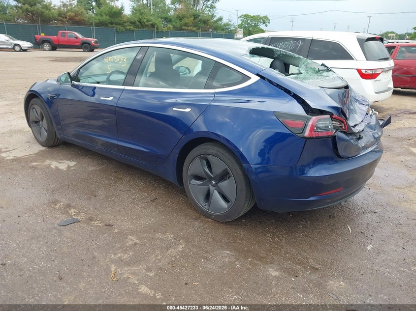 2018 Tesla Model 3 VIN 5YJ3E1EA8JF124994 IAAI salvage auction — STORM DAMAGE, Rebuildable (Florida), sold $3,800 on 2026-07-21 (photo 3)
