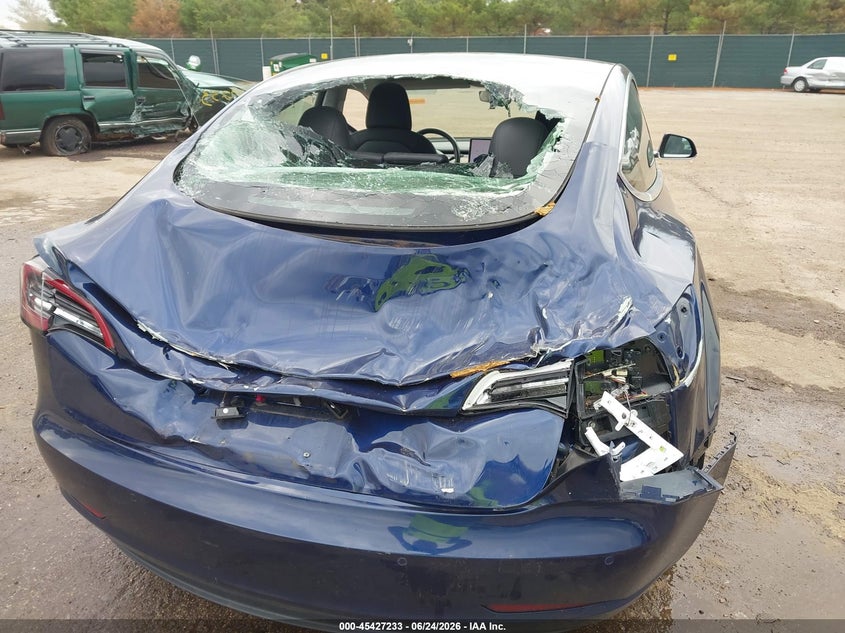 2018 Tesla Model 3 VIN 5YJ3E1EA8JF124994 IAAI salvage auction — STORM DAMAGE, Rebuildable (Florida), sold $3,800 on 2026-07-21 (photo 6)