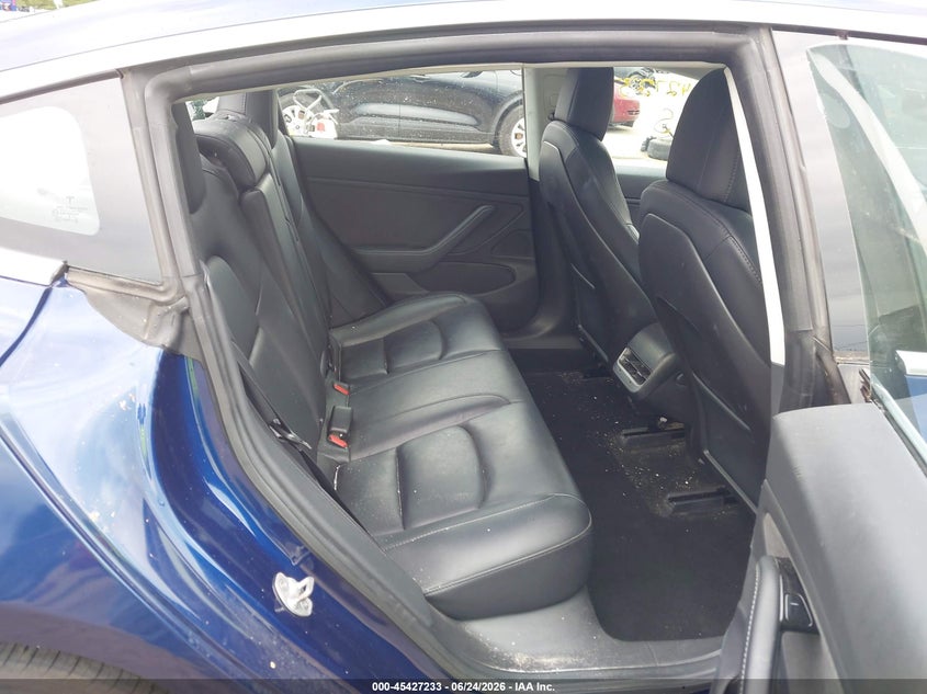 2018 Tesla Model 3 VIN 5YJ3E1EA8JF124994 IAAI salvage auction — STORM DAMAGE, Rebuildable (Florida), sold $3,800 on 2026-07-21 (photo 8)