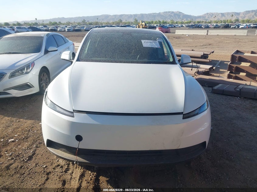 2026 Tesla Model y VIN 7SAYGDED0TA598386 IAAI salvage auction — UNKNOWN, Salvage Title, sold $22,150 on 2026-08-01 (photo 6)