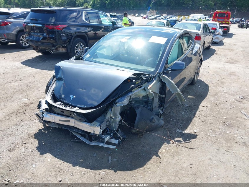 2022 Tesla Model 3 VIN 5YJ3E1EA9NF352654 IAAI salvage auction — ALL OVER, Salvage (Arizona), sold $1,100 on 2026-07-31 (photo 2)