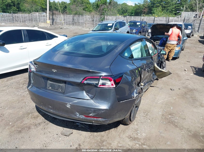 2022 Tesla Model 3 VIN 5YJ3E1EA9NF352654 IAAI salvage auction — ALL OVER, Salvage (Arizona), sold $1,100 on 2026-07-31 (photo 4)