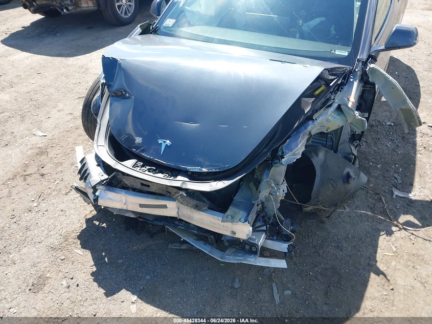 2022 Tesla Model 3 VIN 5YJ3E1EA9NF352654 IAAI salvage auction — ALL OVER, Salvage (Arizona), sold $1,100 on 2026-07-31 (photo 6)