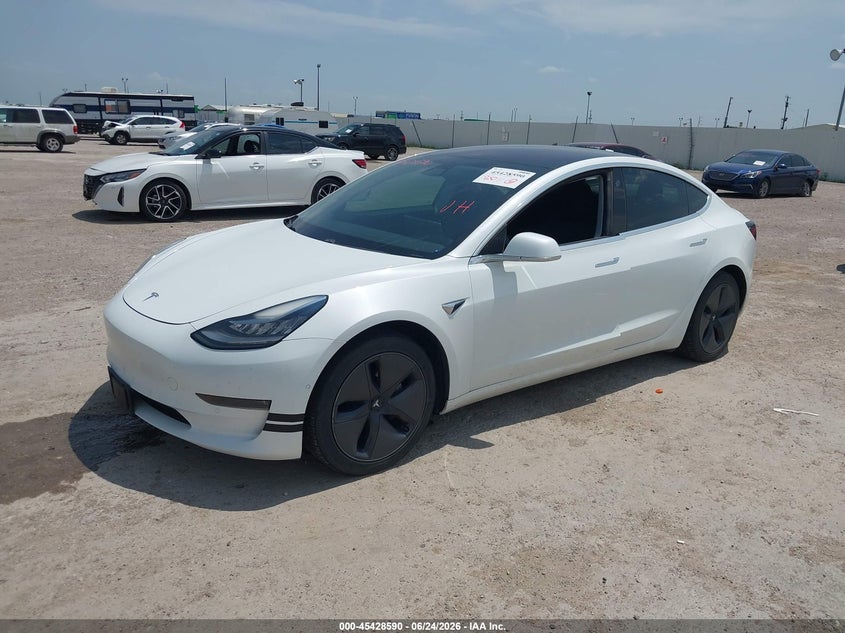 2018 Tesla Model 3 VIN 5YJ3E1EA1JF057722 IAAI salvage auction — SIDE, Salvage (Texas), sold $6,350 on 2026-07-22 (photo 2)