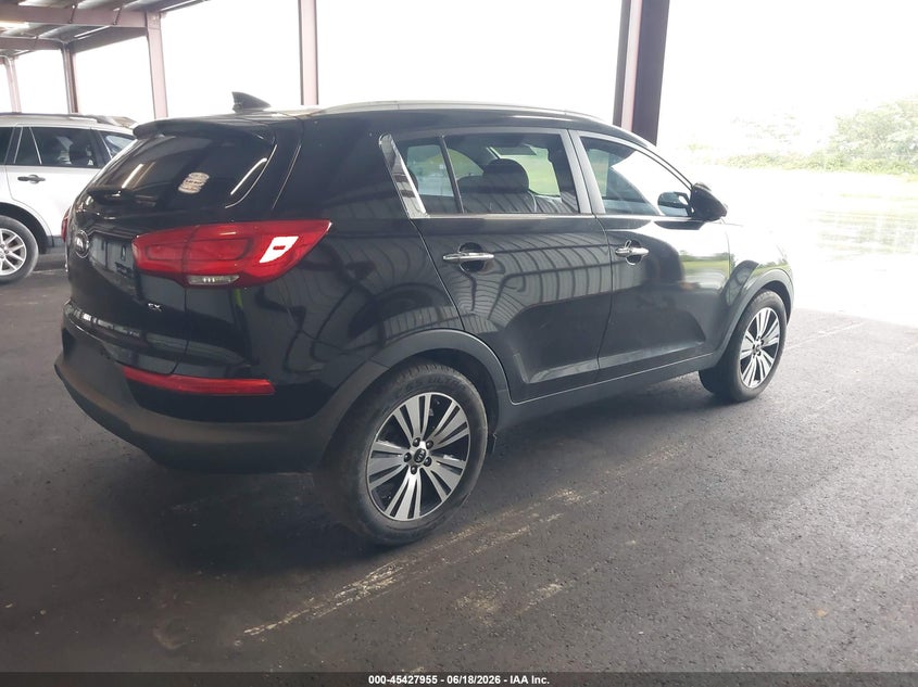 2015 Kia Sportage VIN KNDPC3ACXF7767290 IAAI salvage auction — NORMAL WEAR, Salvage Title, sold $1,500 on 2026-07-28 (photo 4)