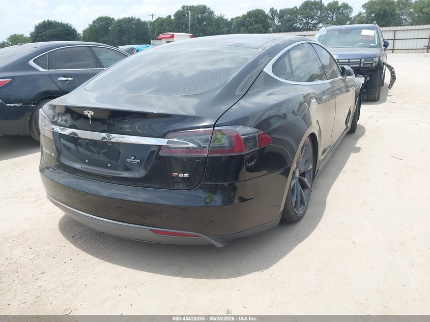 2014 Tesla Model s VIN 5YJSA1H11EFP40397 IAAI salvage auction — ELECTRICAL, Clear (Montana), sold $1,550 on 2026-07-14 (photo 4)