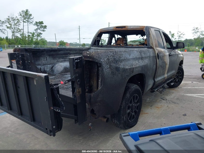 2019 Toyota Tundra VIN 5TFRM5F12KX141767 IAAI salvage auction — INTERIOR BURN, Rebuildable (Florida), sold $3,250 on 2026-07-14 (photo 4)