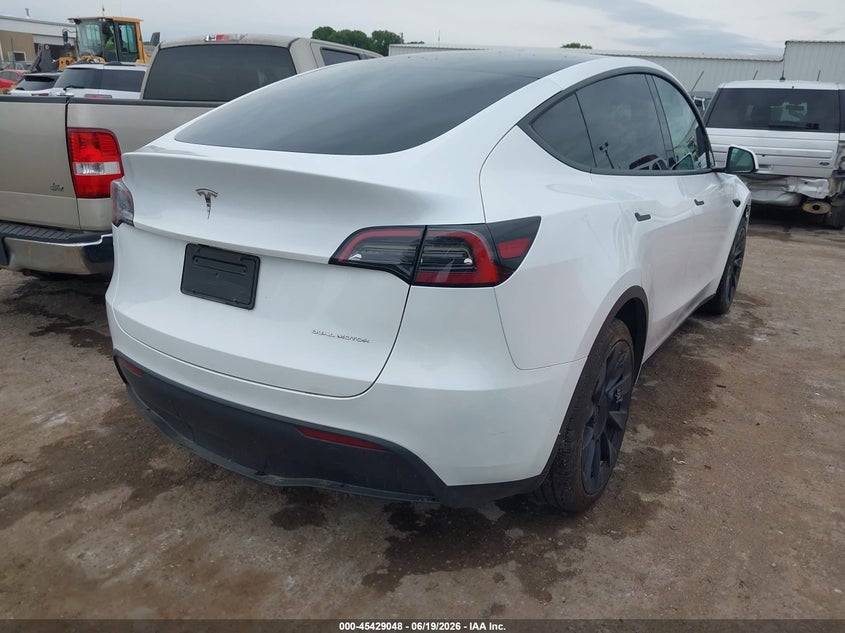 2024 Tesla Model y VIN 7SAYGDEE1RA259752 IAAI salvage auction — UNDERCARRIAGE, Original  (Oklahoma), sold $11,700 on 2026-09-05 (photo 4)