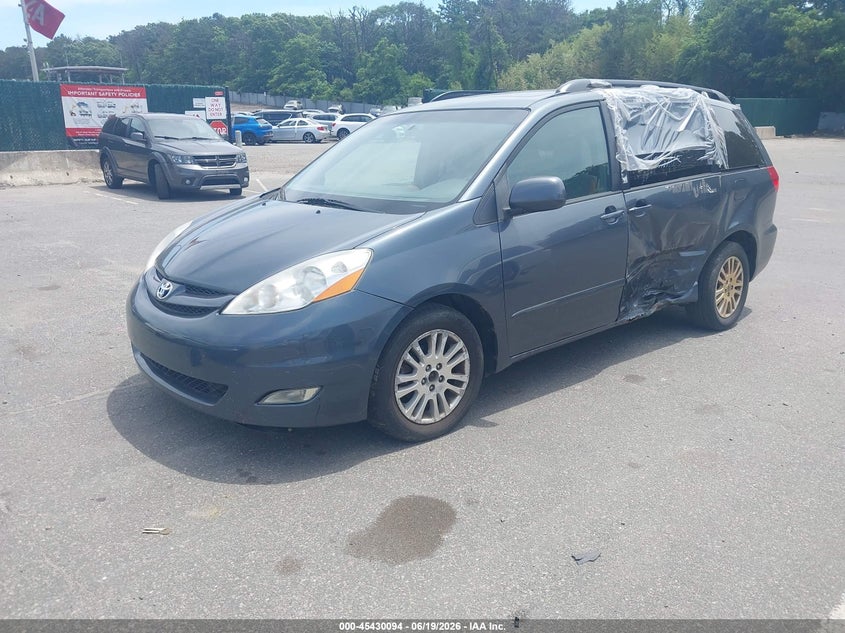 2010 Toyota Sienna VIN 5TDYK4CC7AS337726 IAAI salvage auction — SIDE, Clear (New Jersey), sold $1,400 on 2026-07-28 (photo 2)