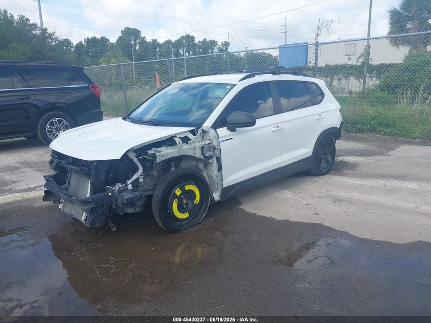 2023 Volkswagen Taos VIN 3VVDX7B2XPM341371 IAAI salvage auction — FRONT & REAR, Clear (Florida), sold $825 on 2026-07-09 (photo 2)