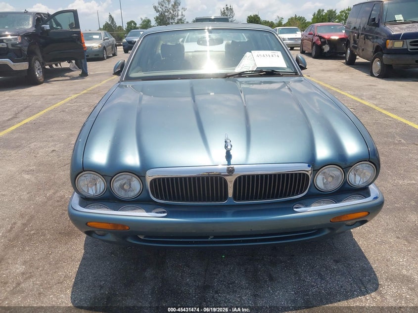 1998 Jaguar Xj series VIN SAJHX1245WC837825 IAAI salvage auction — NORMAL WEAR, Clear (Florida), sold $400 on 2026-07-16 (photo 6)