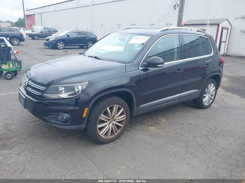 2013 Volkswagen Tiguan VIN WVGBV3AX0DW610969 IAAI salvage auction — NORMAL WEAR, Clear-Dealer Only (Oregon), sold $900 on 2026-07-09 (photo 2)