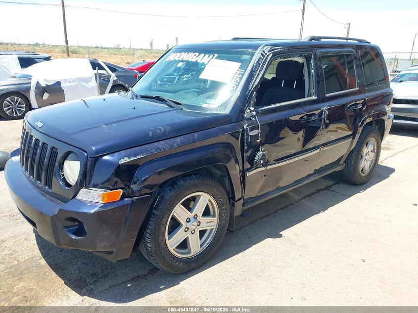 2010 Jeep Liberty (patriot) VIN 1J4NF1GBXAD646233 IAAI salvage auction — LEFT SIDE, Salvage (Texas), sold $25 on 2026-07-22 (photo 2)