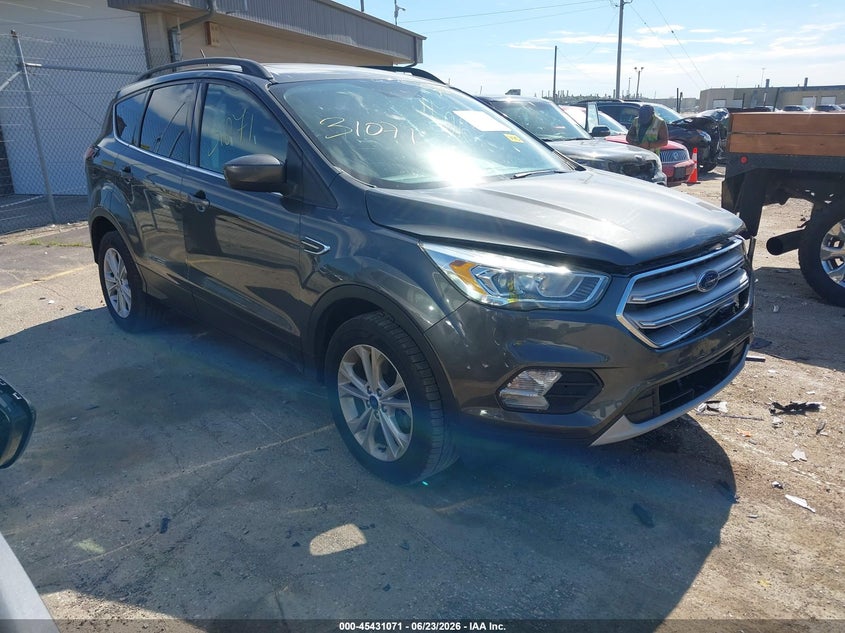 2018 Ford Escape VIN 1FMCU9HD0JUA87627 IAAI salvage auction — LEFT FRONT, Clear (Wisconsin), sold $3,250 on 2026-07-05 (photo 1)