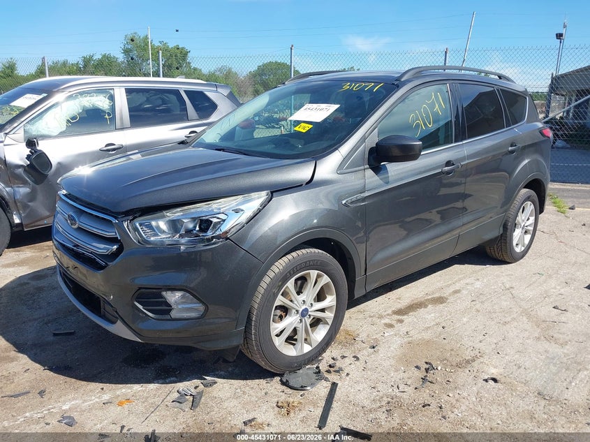2018 Ford Escape VIN 1FMCU9HD0JUA87627 IAAI salvage auction — LEFT FRONT, Clear (Wisconsin), sold $3,250 on 2026-07-05 (photo 2)