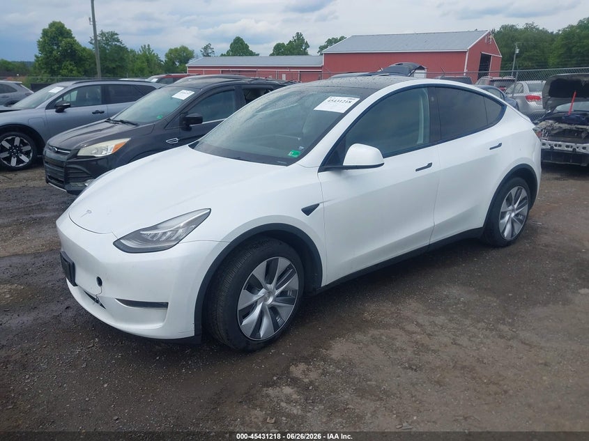 2023 Tesla Model y VIN 7SAYGDEE2PA073165 IAAI salvage auction — REAR END, Salvage (Virginia), sold $10,300 on 2026-07-09 (photo 2)