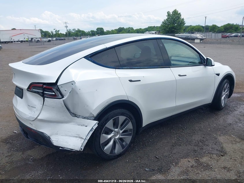 2023 Tesla Model y VIN 7SAYGDEE2PA073165 IAAI salvage auction — REAR END, Salvage (Virginia), sold $10,300 on 2026-07-09 (photo 4)