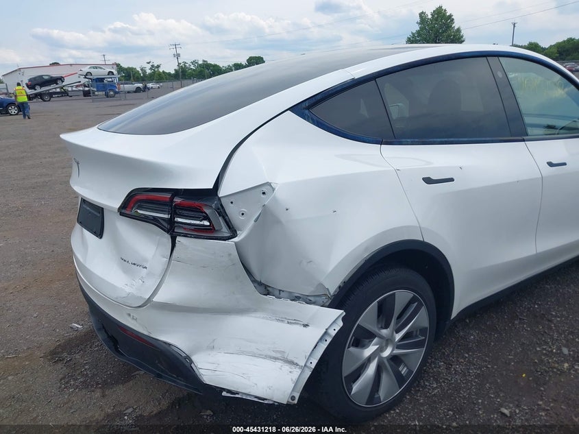 2023 Tesla Model y VIN 7SAYGDEE2PA073165 IAAI salvage auction — REAR END, Salvage (Virginia), sold $10,300 on 2026-07-09 (photo 6)