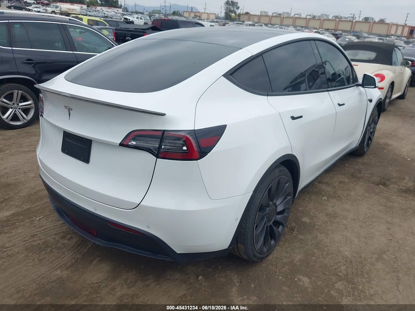 2021 Tesla Model y VIN 5YJYGDEF4MF211647 IAAI salvage auction — RIGHT FRONT, Salvage (California), sold $14,600 on 2026-07-15 (photo 4)