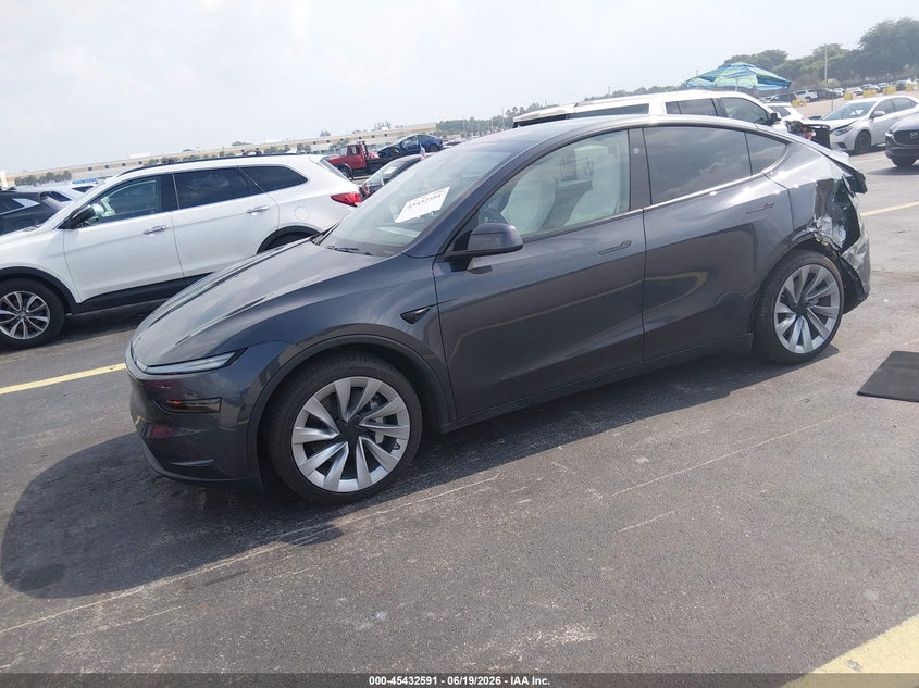 2026 Tesla Model y VIN 7SAYGDED6TA427948 IAAI salvage auction — LEFT REAR, Salvage Title, sold $16,200 on 2026-08-02 (photo 2)