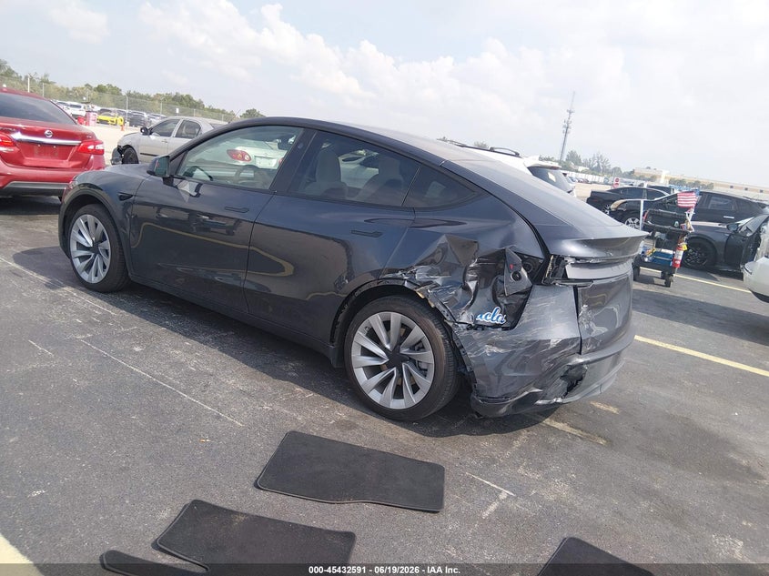 2026 Tesla Model y VIN 7SAYGDED6TA427948 IAAI salvage auction — LEFT REAR, Salvage Title, sold $16,200 on 2026-08-02 (photo 3)