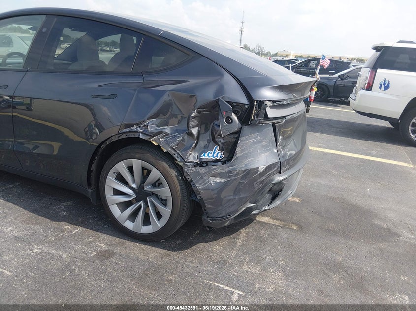 2026 Tesla Model y VIN 7SAYGDED6TA427948 IAAI salvage auction — LEFT REAR, Salvage Title, sold $16,200 on 2026-08-02 (photo 6)