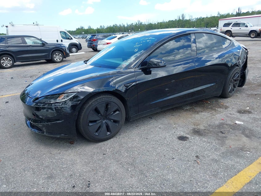 2024 Tesla Model 3 VIN 5YJ3E1EA4RF863890 IAAI salvage auction — REAR END, Salvage Title, sold $11,900 on 2026-08-02 (photo 2)