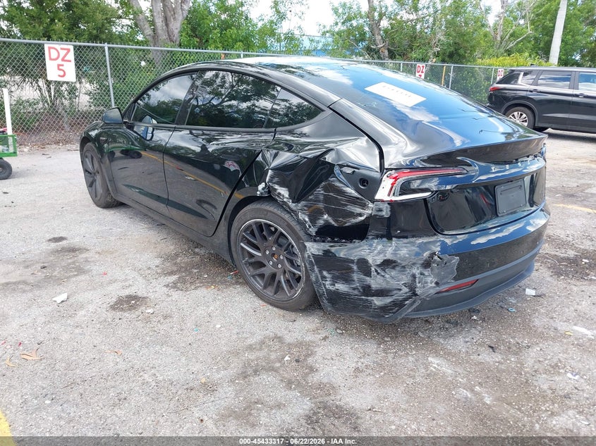 2024 Tesla Model 3 VIN 5YJ3E1EA4RF863890 IAAI salvage auction — REAR END, Salvage Title, sold $11,900 on 2026-08-02 (photo 3)