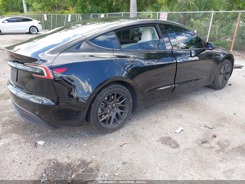 2024 Tesla Model 3 VIN 5YJ3E1EA4RF863890 IAAI salvage auction — REAR END, Salvage Title, sold $11,900 on 2026-08-02 (photo 4)
