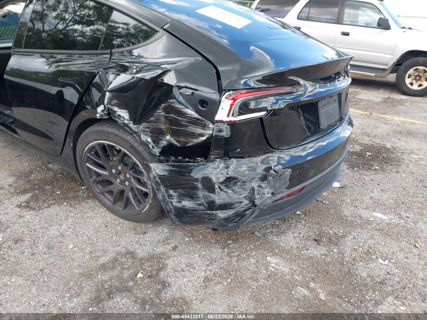 2024 Tesla Model 3 VIN 5YJ3E1EA4RF863890 IAAI salvage auction — REAR END, Salvage Title, sold $11,900 on 2026-08-02 (photo 6)