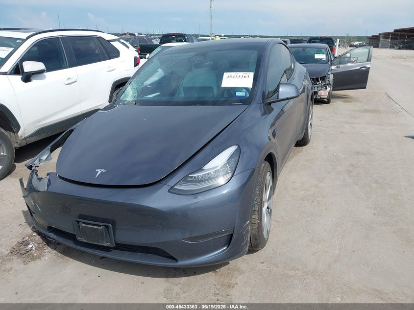 2023 Tesla Model y VIN 7SAYGDEEXPA098203 IAAI salvage auction — RIGHT FRONT, Salvage (Texas), sold $9,500 on 2026-07-16 (photo 2)