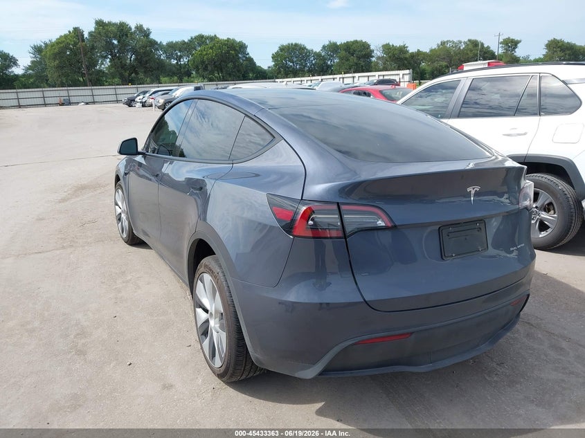 2023 Tesla Model y VIN 7SAYGDEEXPA098203 IAAI salvage auction — RIGHT FRONT, Salvage (Texas), sold $9,500 on 2026-07-16 (photo 3)