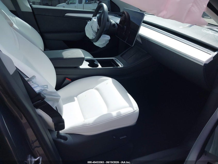 2023 Tesla Model y VIN 7SAYGDEEXPA098203 IAAI salvage auction — RIGHT FRONT, Salvage (Texas), sold $9,500 on 2026-07-16 (photo 5)