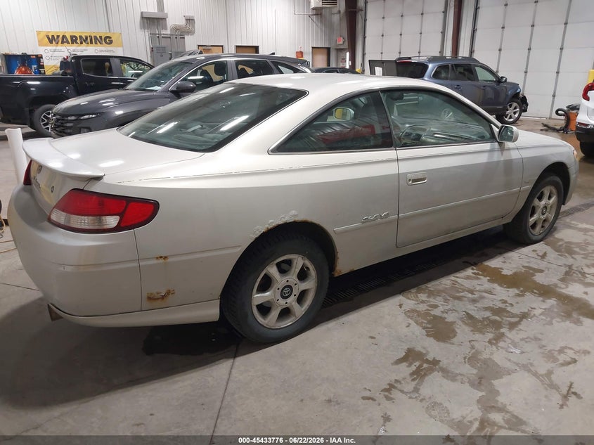 2000 Toyota Camry solara VIN 2T1CF22P3YC275929 IAAI salvage auction — REAR END, Salvage (North Dakota), sold $350 on 2026-07-10 (photo 4)