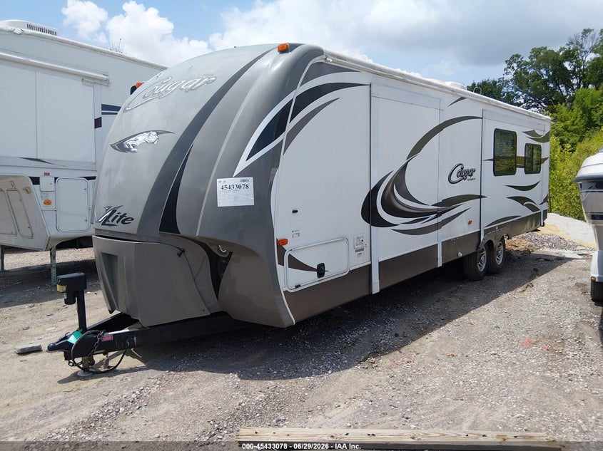 2013 Cougar Travel trlr VIN 4YDT30R24DV507689 IAAI salvage auction — SIDE, Salvage (Tennessee), sold $4,450 on 2026-07-15 (photo 2)