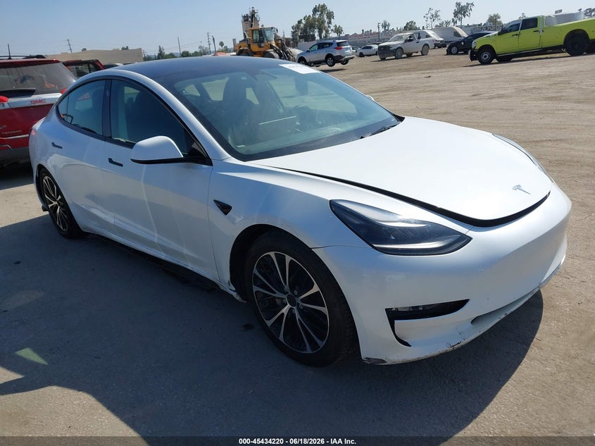 2023 Tesla Model 3 VIN 5YJ3E1EA7PF550703 — IAAI salvage auction photo
