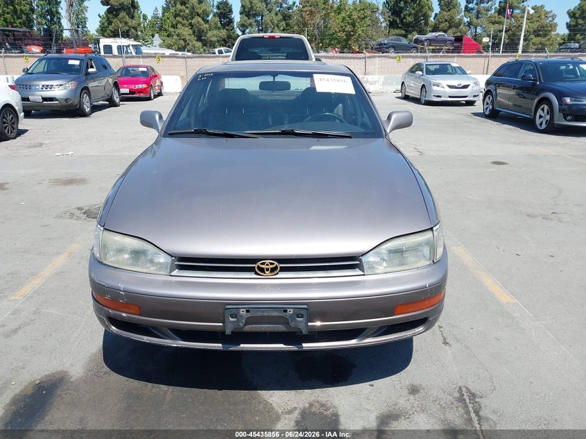 1994 Toyota Camry VIN JT2GK12E5R0065973 IAAI salvage auction — NORMAL WEAR, Salvage Title - Dealer (California), sold $325 on 2026-07-13 (photo 6)