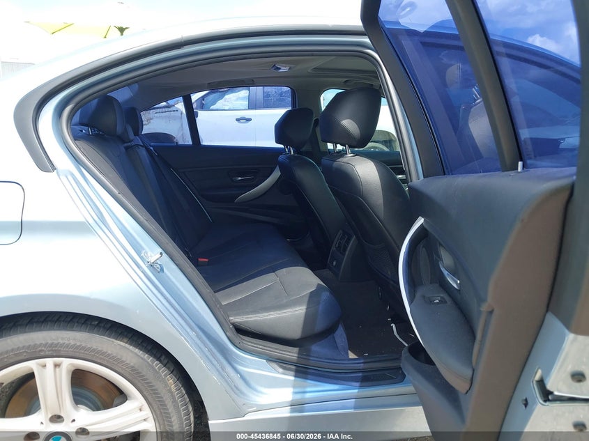 2012 BMW 3er VIN WBA3A5C53CF344595 IAAI salvage auction — WATER/FLOOD, Salvage (Texas), sold $550 on 2026-07-18 (photo 8)