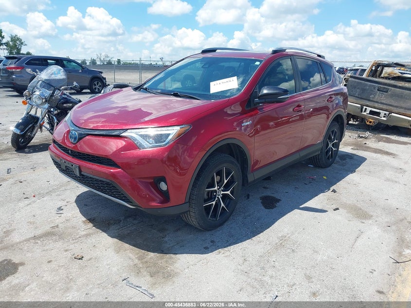 2018 Toyota Rav 4 VIN JTMJJREV1JD235379 IAAI salvage auction — HAIL, Salvage Title, sold $2,850 on 2026-07-28 (photo 2)