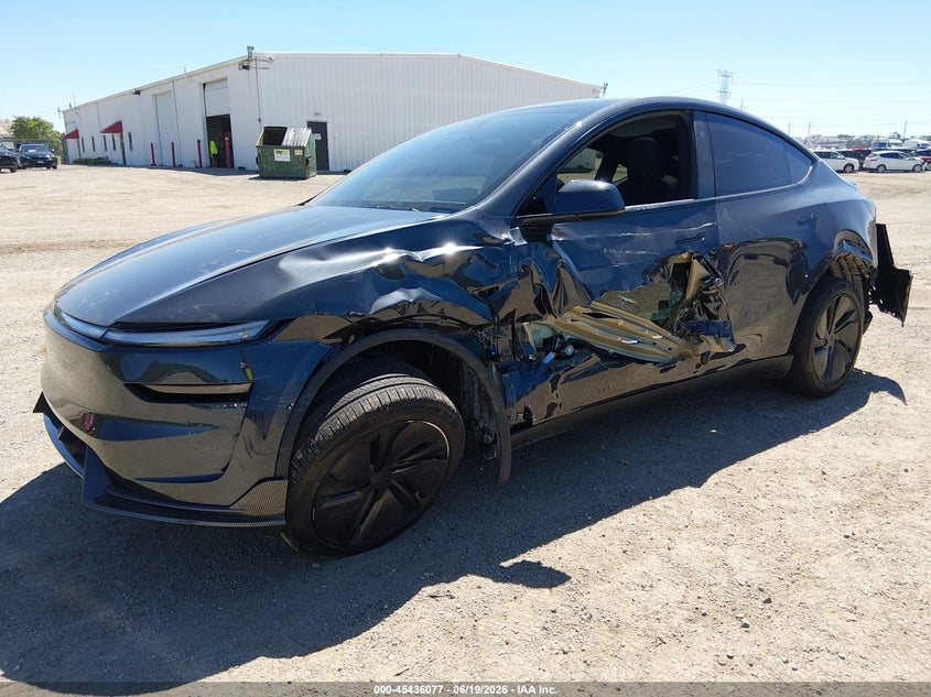 2026 Tesla Model y VIN 7SAYGDED4TF618674 IAAI salvage auction — FRONT & REAR, Salvage Title, sold $16,800 on 2026-08-27 (photo 2)