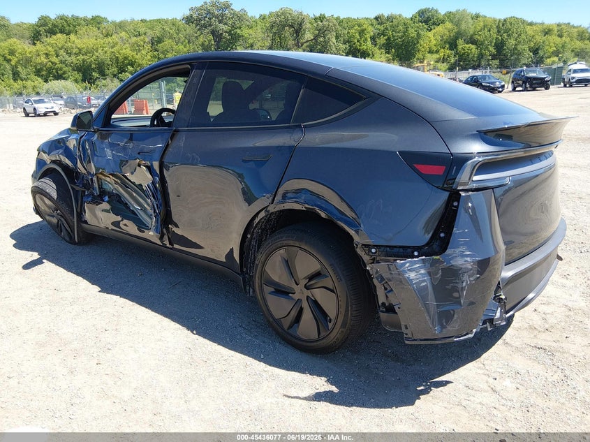 2026 Tesla Model y VIN 7SAYGDED4TF618674 IAAI salvage auction — FRONT & REAR, Salvage Title, sold $16,800 on 2026-08-27 (photo 3)